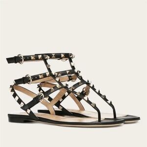 Valentino Garavani Black Sandals with Gold Studs